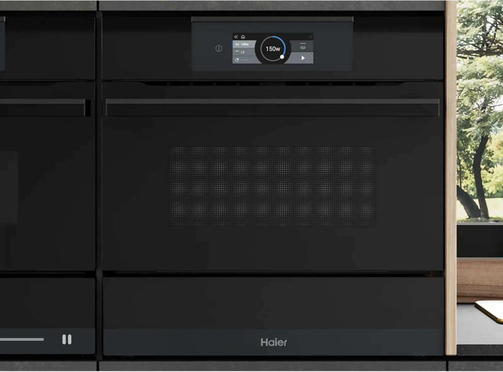 Four encastrable Haier noir avec écran tactile digital