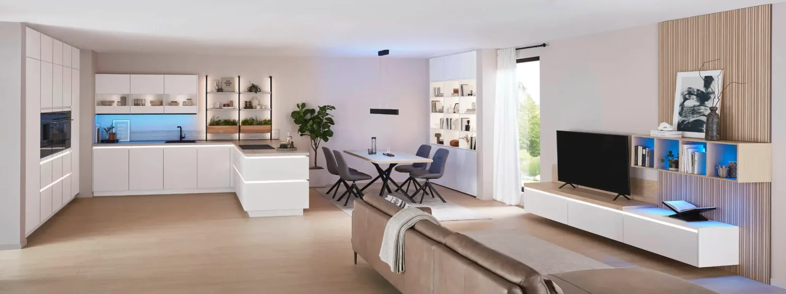 Éclairage LED intégré dans un séjour ouvert avec cuisine équipée, salle à manger et meuble TV