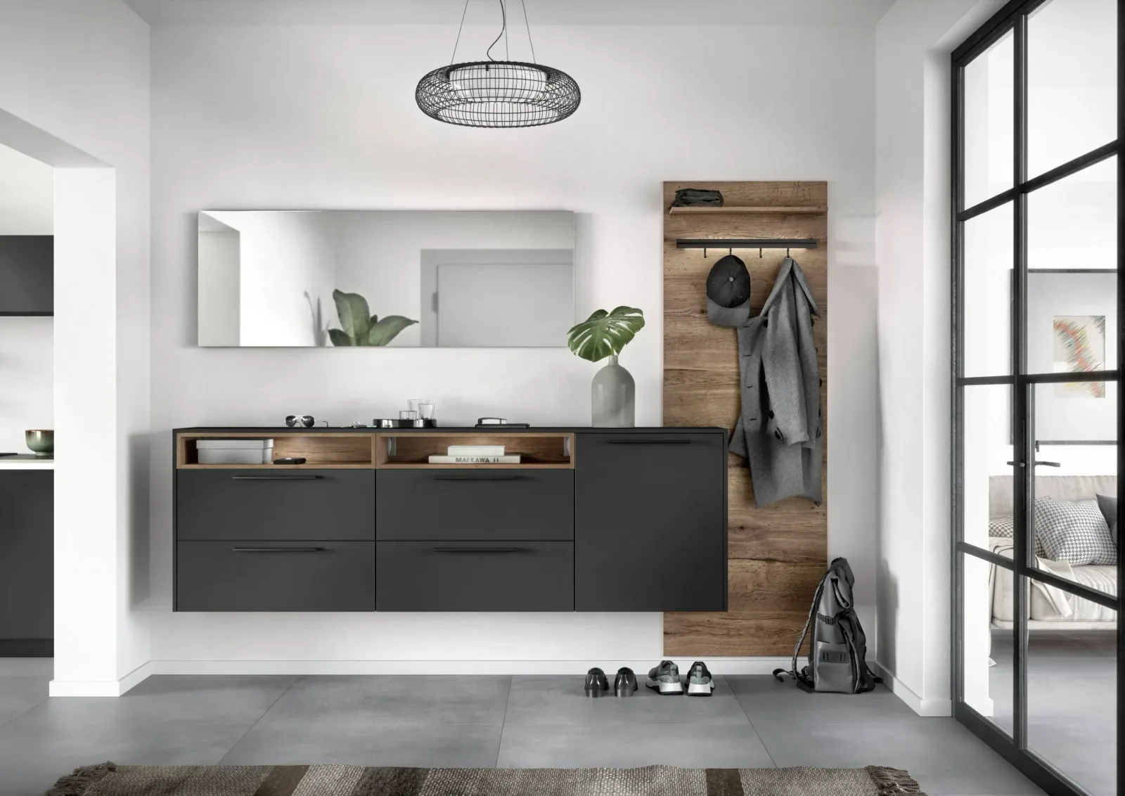 Meuble d’entrée sur mesure noir et bois avec tiroirs, miroir et panneau à patères