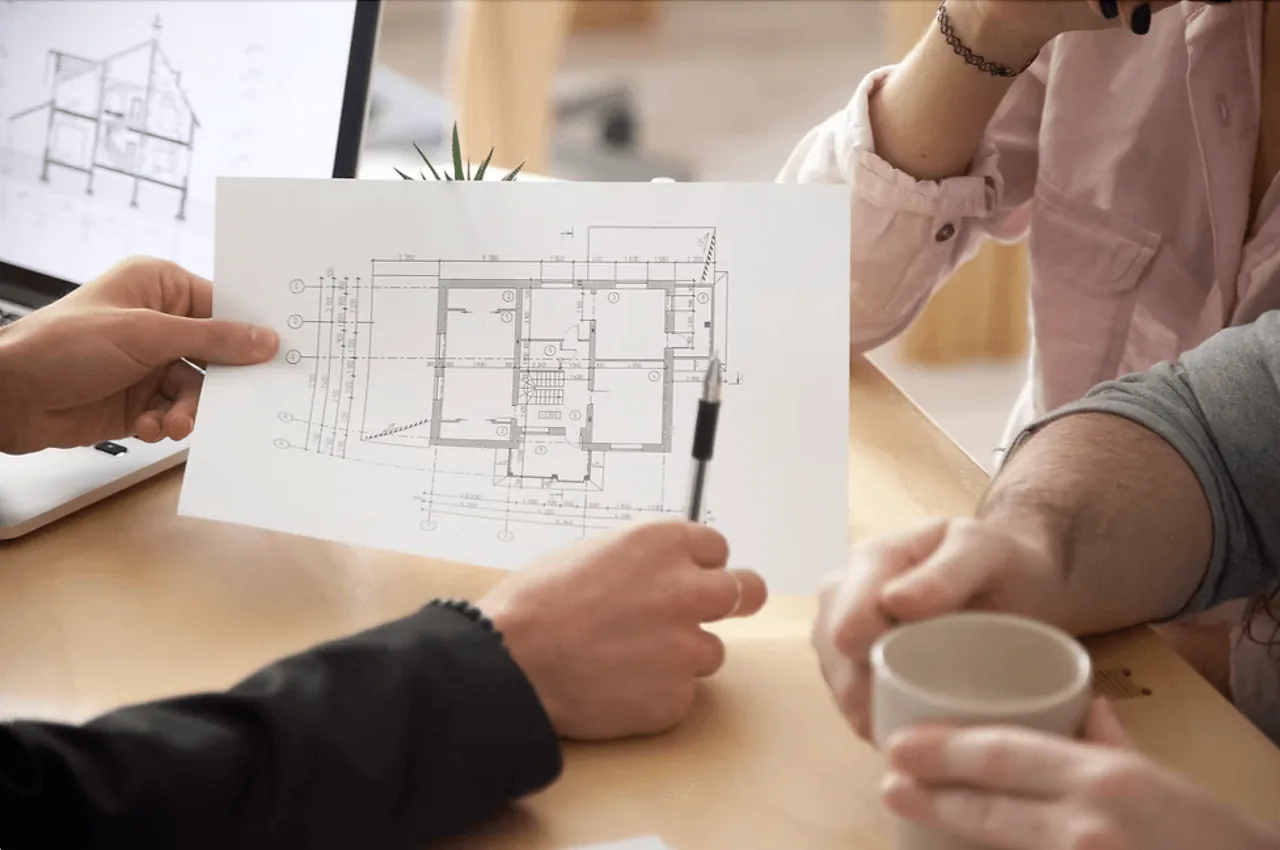 Rendez-vous conseil Cuisines ELITE autour d’un plan architectural